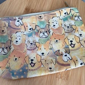 Dog purse or makeup bag.